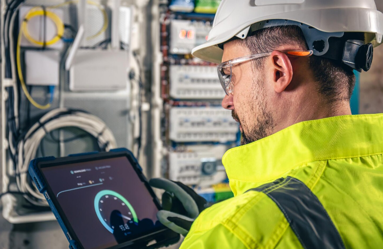 Worker analyzing data through tablet, showcasing technology trends in banking and finance