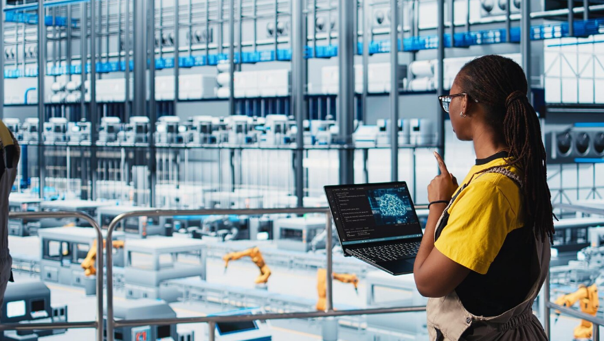 Woman using laptop to monitor the latest technology trends in the banking and financial services industry