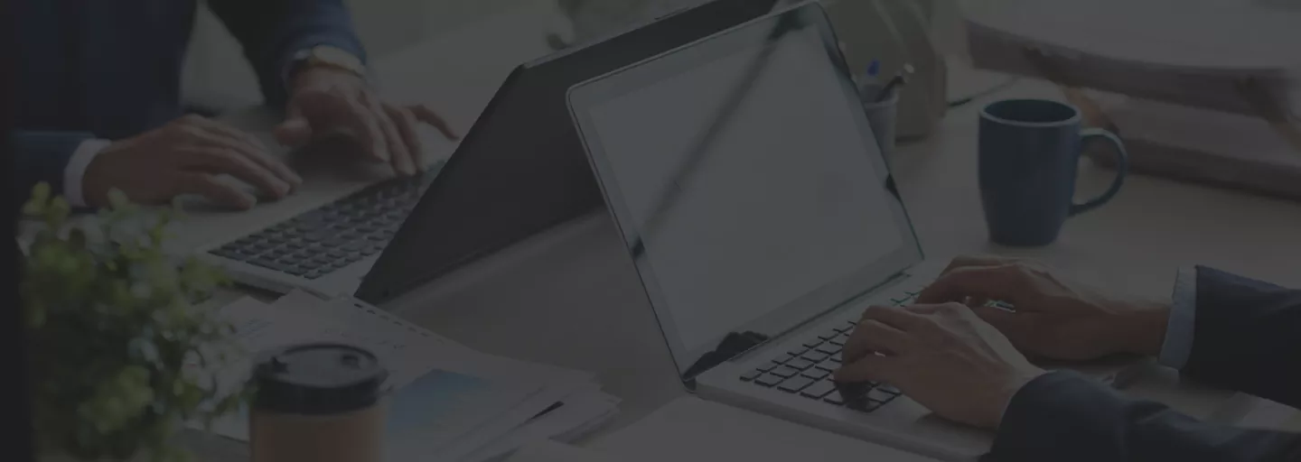 Portals Development Teams working across from each other in an A Office Environment